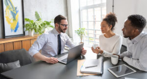 Image of a banker talking to clients