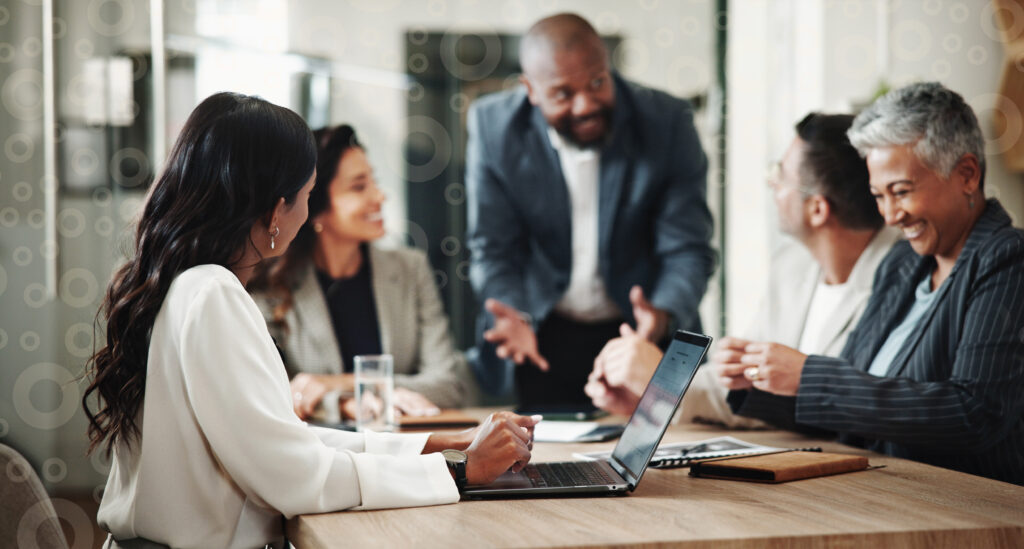 Trust department team overviewing daily tasks on a laptop screen.