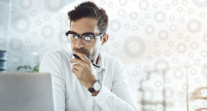 Professional businessman overviewing trust reporting software